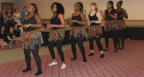 Students perform an African dance at the International Festival April 15 in the Cambria Room. The festival is an example of programming to promote racial inclusion.