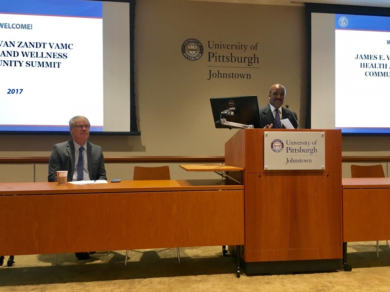 Christopher+Watson%2C+associate+chief+of+staff+at+Altoona%E2%80%99s+Veteran+Affairs+Medical+Center%2C+spoke+at+a+summit+Thursday+about+veterans+seeking+clinical+help+for+mental+illness.+Raymond+Wrabley+%28left%29%2C+also+spoke.+