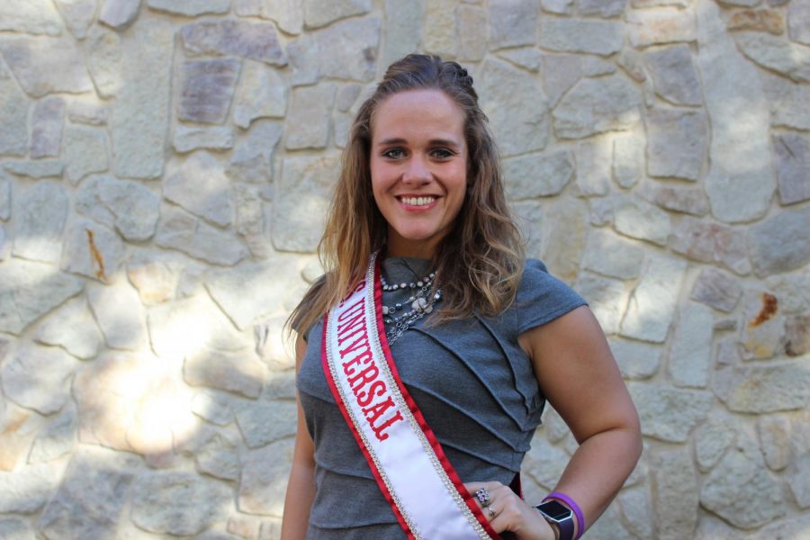 Kristina+Marinkovich%2C+Pitt-Johnstown%E2%80%99s+international+student+services+coordinator%2C+poses+while+wearing+her+Ms.+Universal+sash.+She+was+crowned+Sept.+8+in+London.+