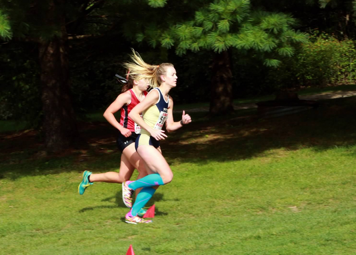 Pitt-Johnstown+cross+country+runner+Tori+Fulkroad+%28right%29+runs+at+the+Saint+Francis+University+Father+Bede+Cross+Country+invitational+at+Immegrun+Golf+Club+Sept.+1.+Fulkroad+finished+third+overall+with+a+20%3A31.9+time.+