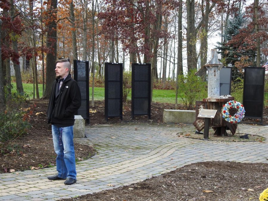 U.S.+veteran++and+Pitt-Johnstown+student+Cameron+Carr+stands+in+front+of+The+Heroes+Memorial+near+Whalley+Chapel+Friday.+