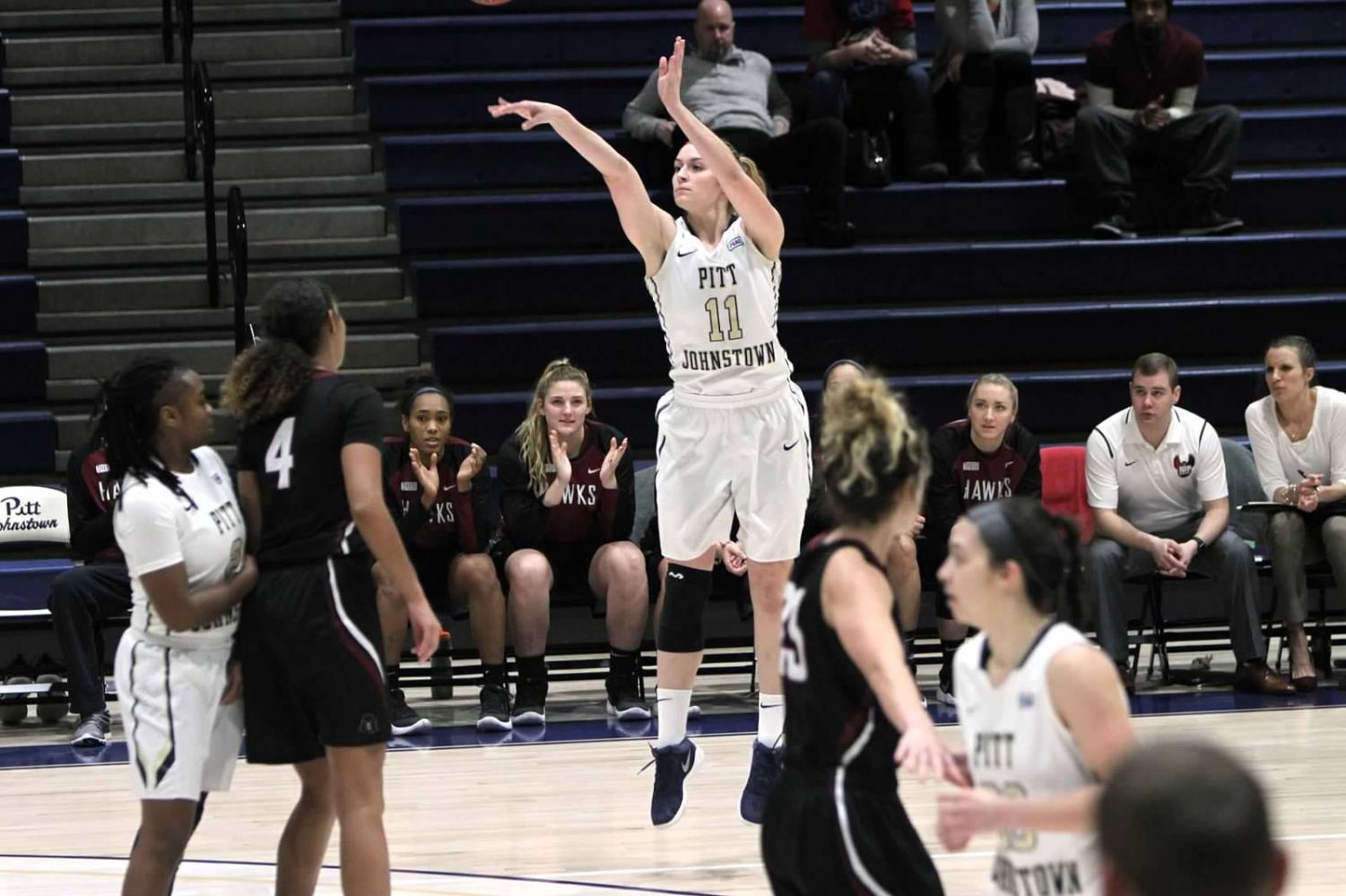 Olivia McCabe attempts a two-point shot against Indiana (Pa.) University Jan. 4 at the Sports Center. McCabe scored her 1,000th point in a Jan. 6 game against Gannon University.