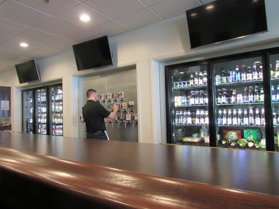 Bartender+Devin+Layton+pours+a+beer+from+one+of+the+taps+in+preparation+for+the+dinner+crowd+at+Tulunes+Steak+and+Alehouse+Jan.+30.+