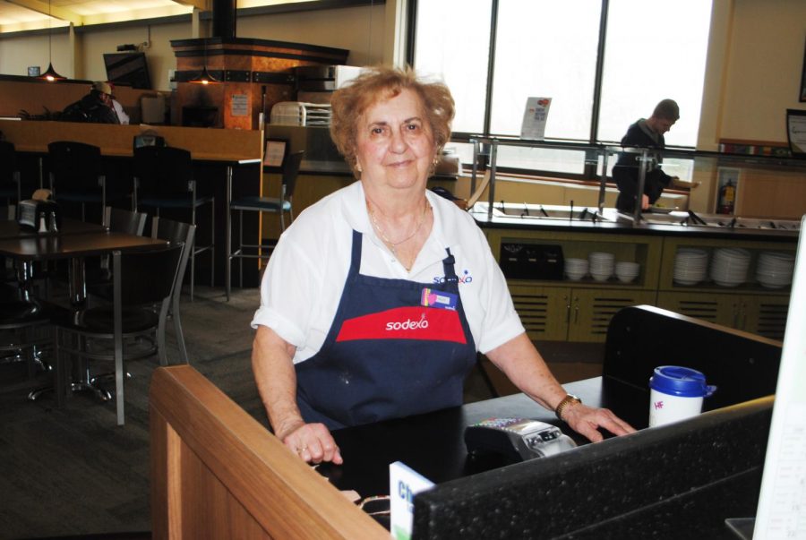 Sodexo+worker+Helen+Ferrante+stands%2C+ready+with+a+smile%2C+to+swipe+students+into+the+Student+Union+dining+hall.+