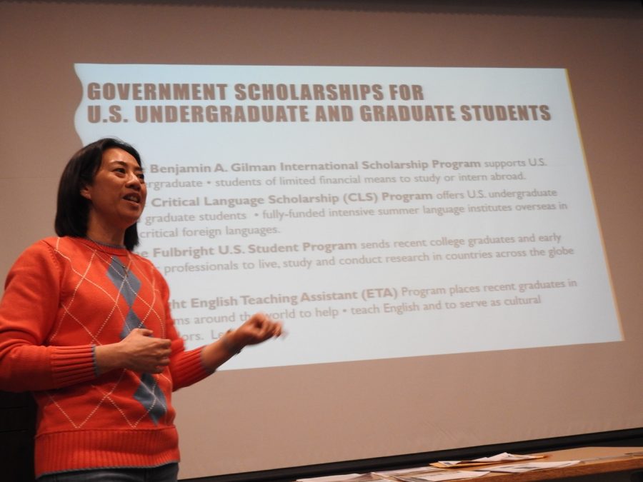 English+literature+instructor+Tuangtip+Klinbubpa-Neff+tells+students+about+scholarship+opportunities+at+a+March+27+study-abroad+seminar.