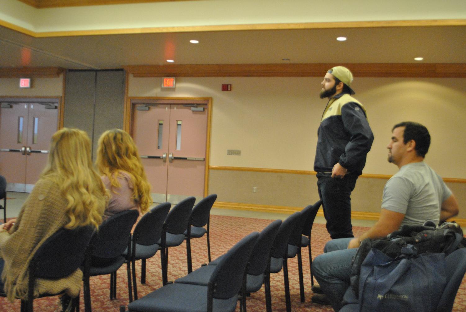 Rugby club President Owen Small discusses with student governors solutions to their fields and gyms dilemma Oct. 22 at the Student Union.