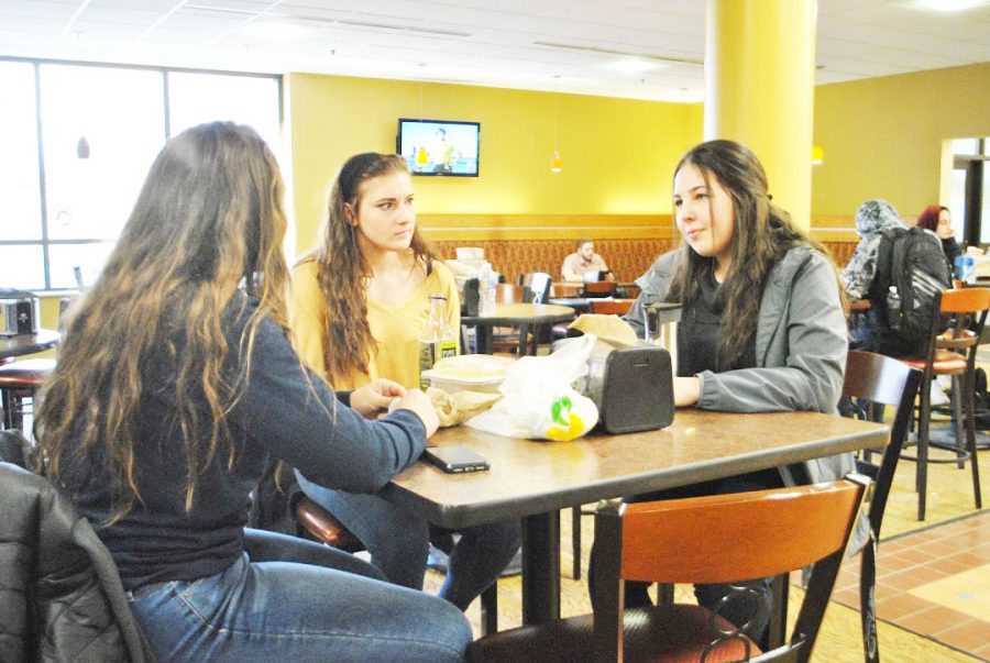 Sophomore+Tessa+Fry+%28left%29%2C+junior+Emily+Kaczmarek+%28center%29+and+sophomore+Isa+Lanthaler+%28right%29+hang+out+in+the+Student+Union+on+Feb.+8.