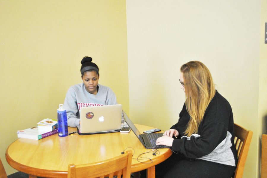 Sophomores+Ashley+Dean+and+Abby+Bell+studied+Friday+in+the+Owen+Library.