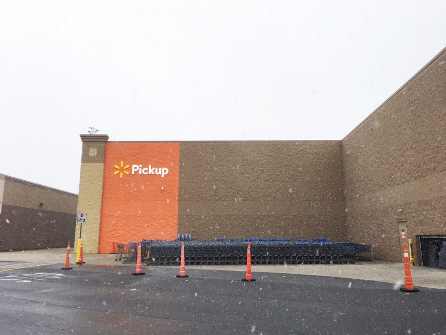 Walmart%E2%80%99s+grocery-pickup+service+is+located+at+the+side+of+the+store.+Customers+can+park+their+cars+in+the+designated+parking+area+and+wait+for+their+groceries.